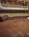 Crawl space drainage matting installed in a home in Burlington