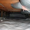 A sealed crawl space with an insulated hot air duct in Bothell.