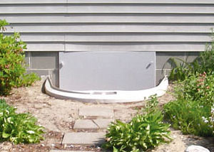 Rigid plastic crawl space access well installed in a Bothell crawl space