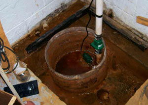 Extreme clogging and rust in a Monroe sump pump system
