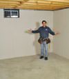 Lake Stevens basement insulation covered by EverLast™ wall paneling, with SilverGlo™ insulation underneath